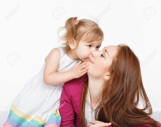 19430973-Happy-woman-and-young-girl-child-smiling-in-bed-Mother-day-concept-Stock-Photo